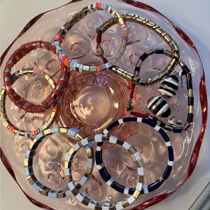 Roxanne Assoulin Colorful Bracelets-8 bracelets and a pair of earrings.